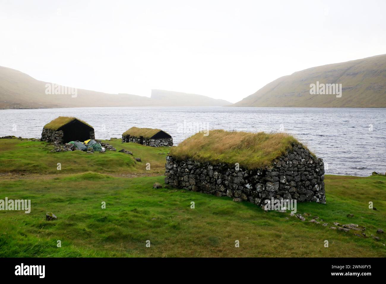 Traditional houses in a scenic landscape, Faroe islands Stock Photo