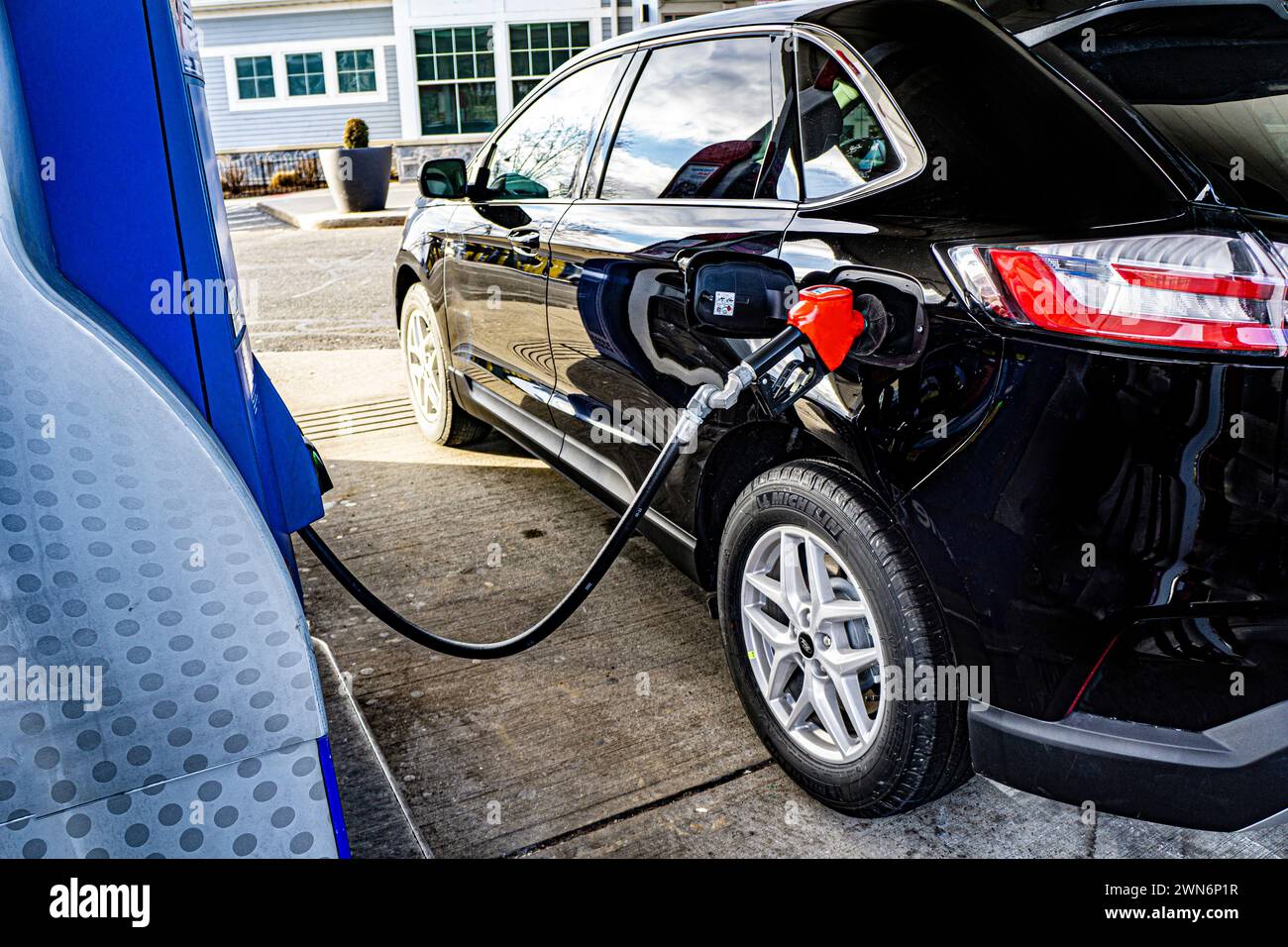 Car refueling at gasoline pump Stock Photo