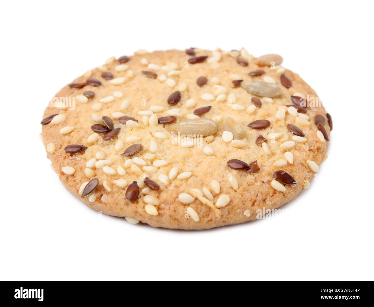 Round cereal cracker with flax, sunflower and sesame seeds isolated on ...