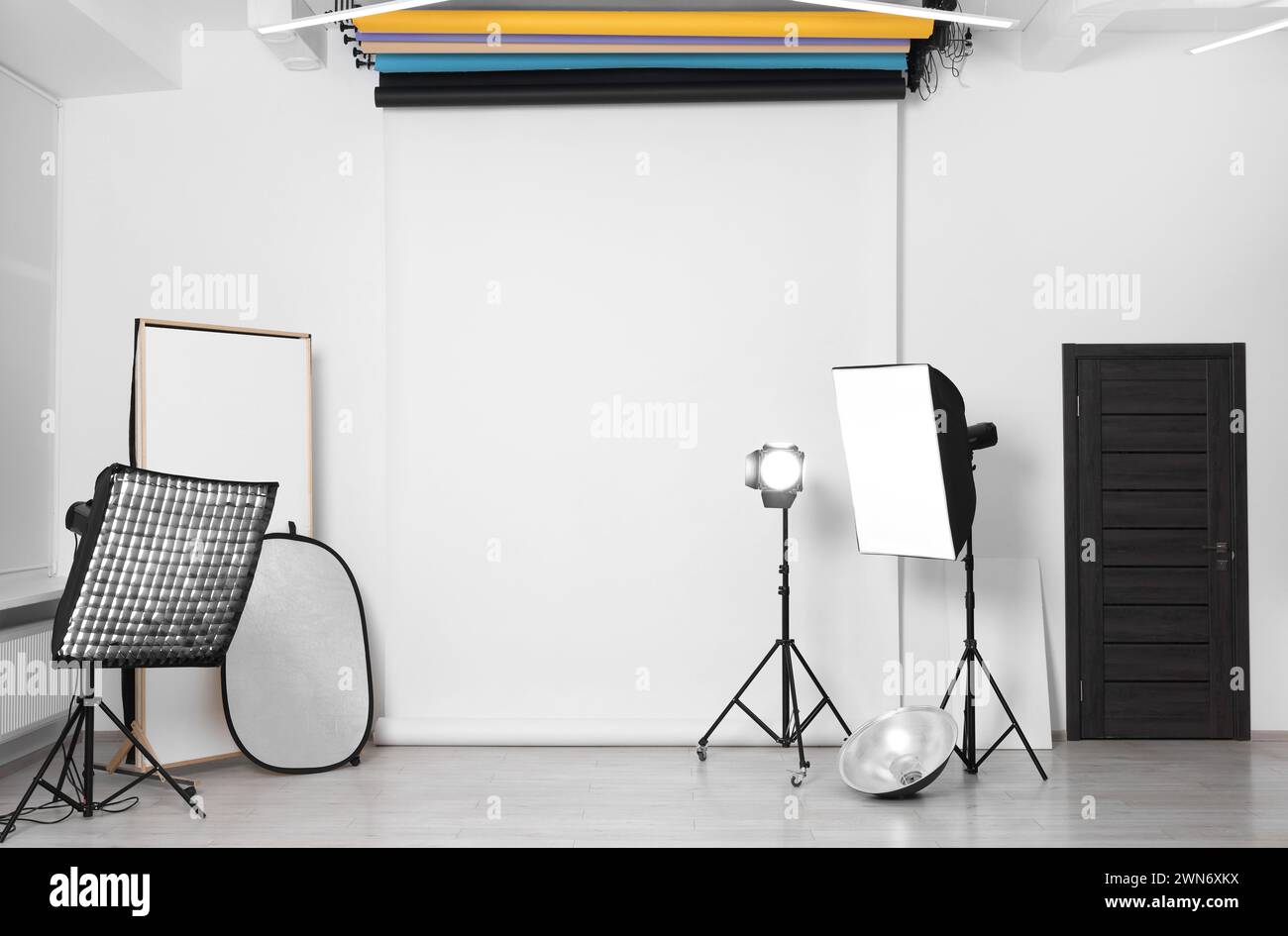 White photo background and professional lighting equipment in studio Stock Photo