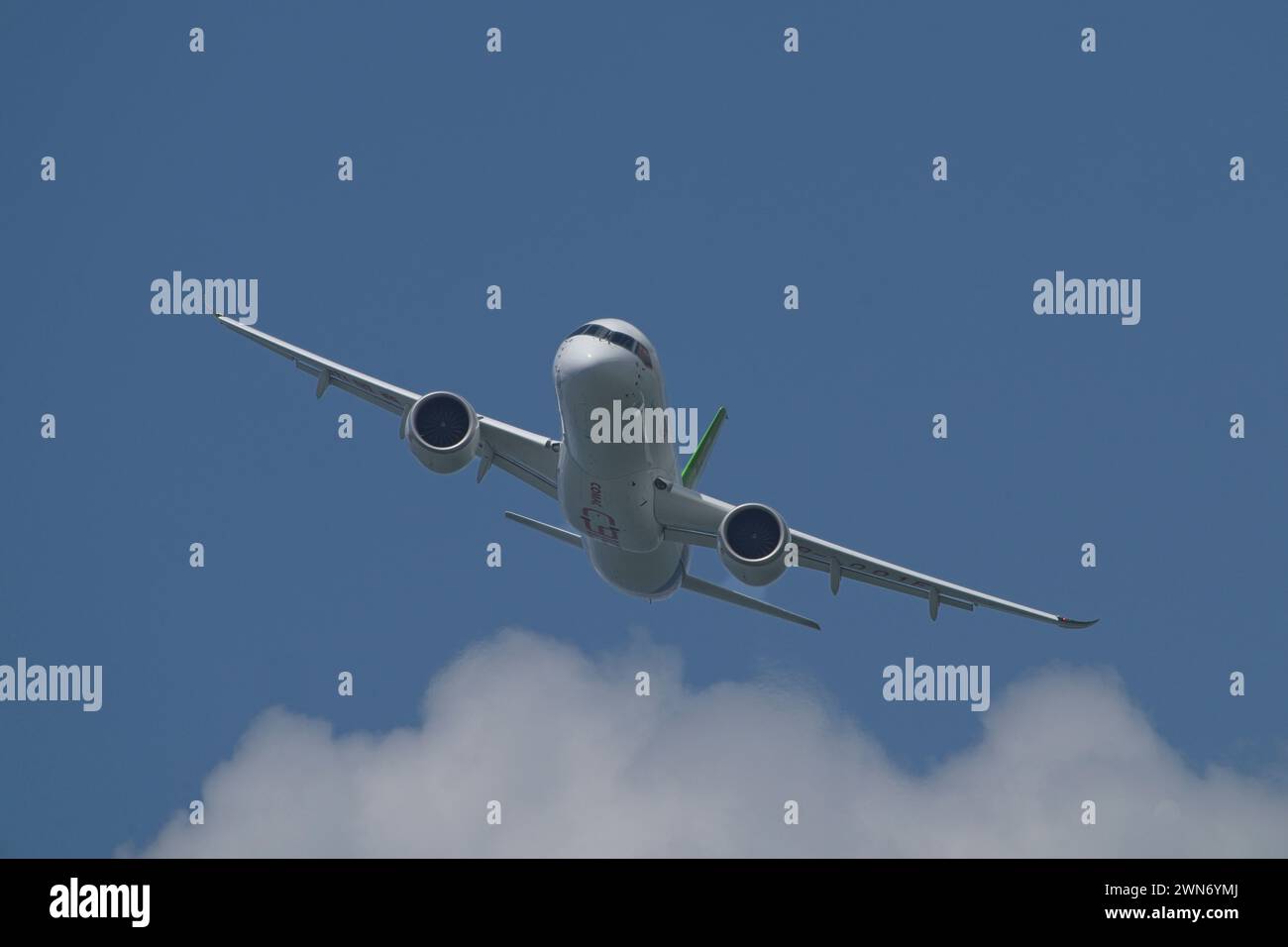 SINGAPORE - FEBRUARY 20, 2024:  China commercial narrow-body aircraft, the COMAC C919 B-001F doing an aerial display at the Singapore Airshow 2024. Stock Photo