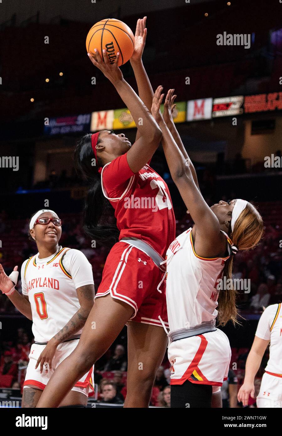College Park, USA. 29th Feb, 2024. COLLEGE PARK, MD: - FEBRUARY 29: Wisconsin Badgers forward Serah Williams (25) shoots over Maryland Terrapins guard Bri McDaniel (24) during a women's college basketball game between the Maryland Terrapins and the Wisconsin Badgers at Xfinity Center, in College Park, Maryland on February 29, 2024. (Photo by Tony Quinn/SipaUSA) Credit: Sipa USA/Alamy Live News Stock Photo