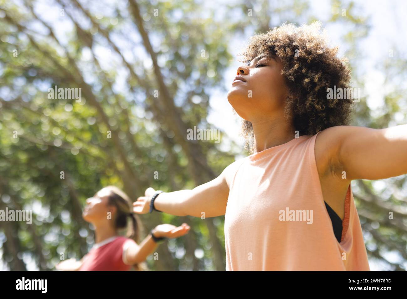 Two women biracial caucasian hi-res stock photography and images - Alamy