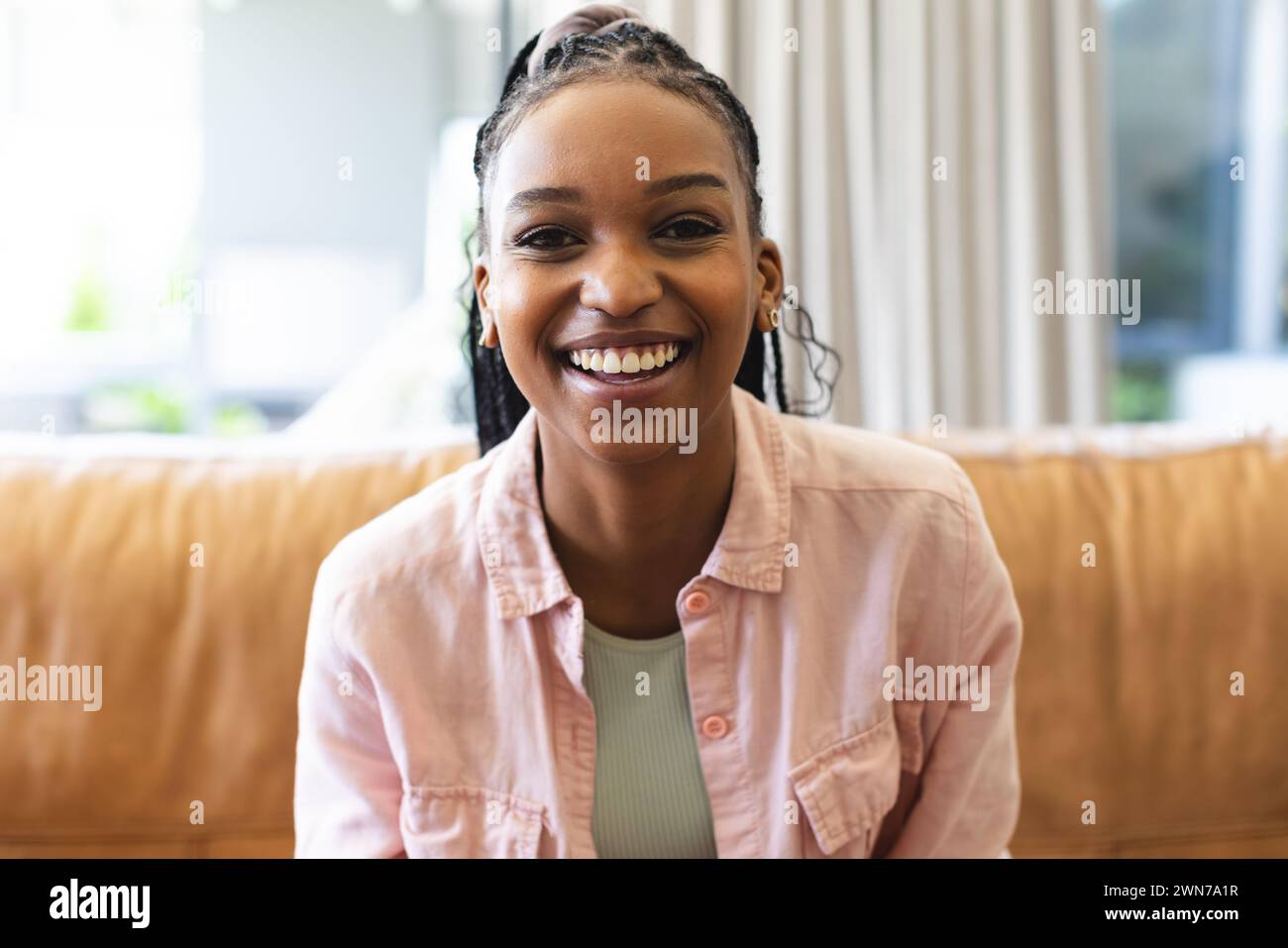 Seated african woman hi-res stock photography and images - Alamy