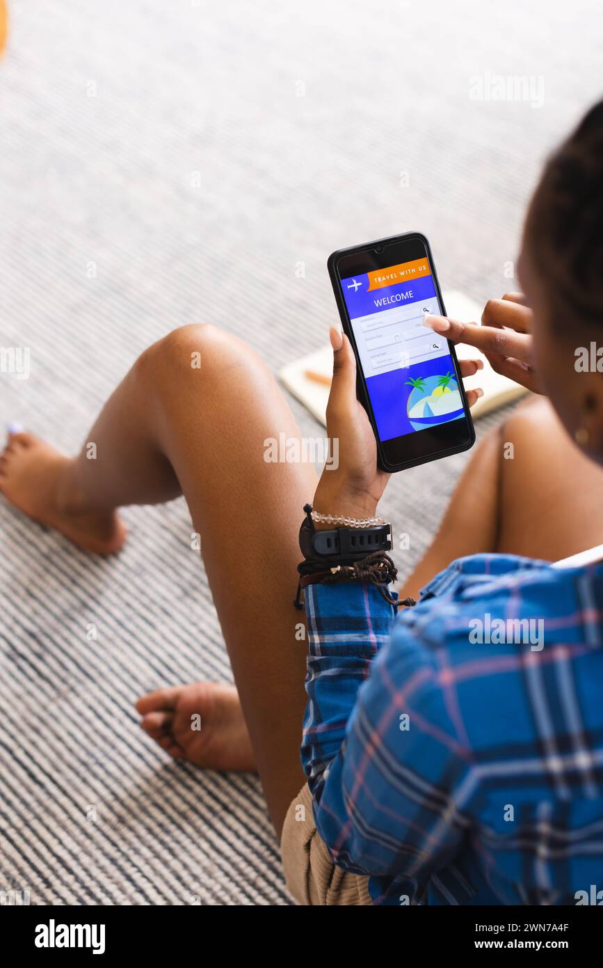 Seated african woman hi-res stock photography and images - Alamy