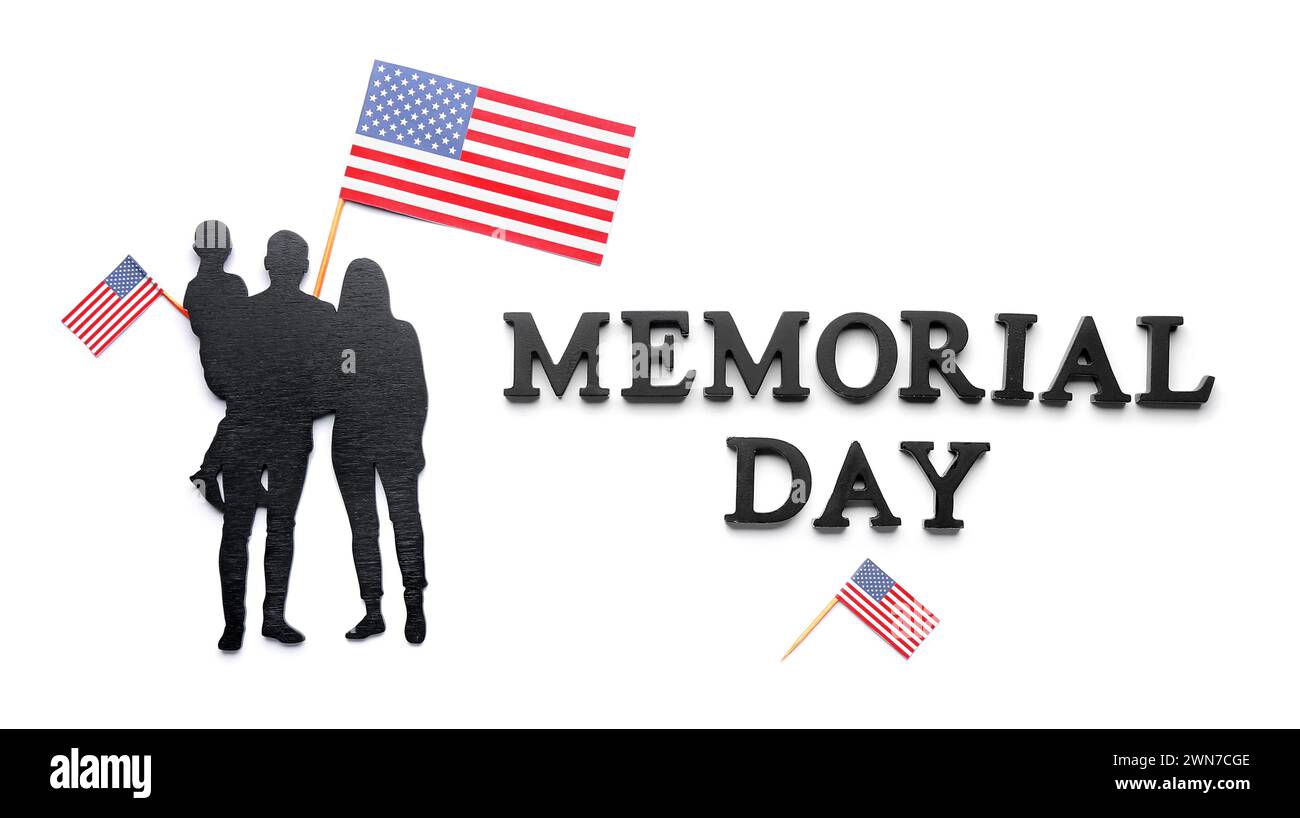Text MEMORIAL DAY with family figure and USA flags on white background Stock Photo