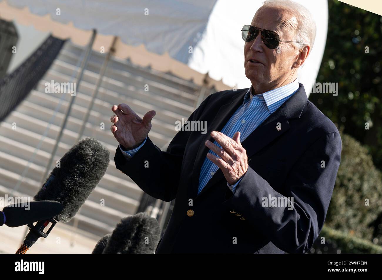 Washington, DC, USA. 29th Feb, 2024. United States President Joe Biden speaks to members of the media on the South Lawn of the White House before boarding Marine One in Washington, DC, US, on Thursday, February 29, 2024. Biden plans to visit Brownsville, Texas, where he will press lawmakers to pass a bipartisan Senate border security deal that was rejected by Republicans at Trumps urging and meet with US Border Patrol agents, law enforcement and local leaders. Credit: Leigh Vogel/Pool via CNP/dpa/Alamy Live News Stock Photo