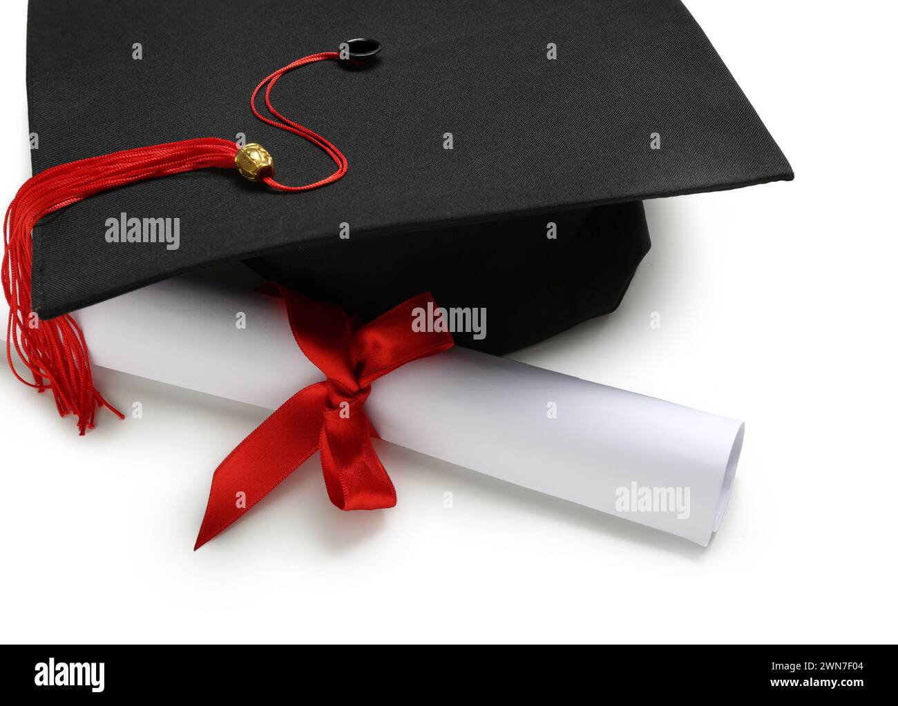 Mortar board and diploma on white background Stock Photo - Alamy