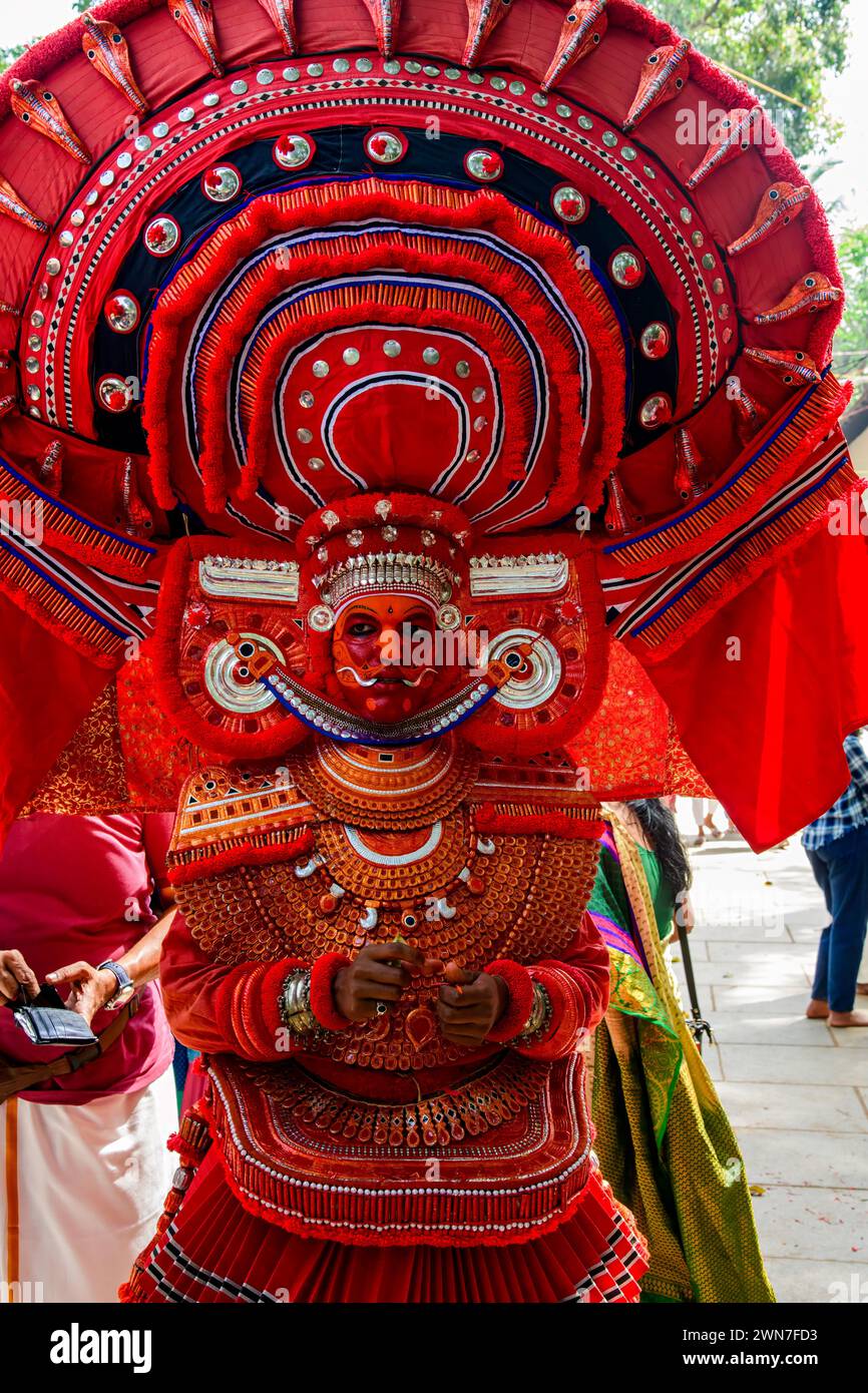 Embark on a Journey Through Time: Andalurkavu's Revered Theyyam Festival, Where Mythology Comes Alive in Spectacular Splendor Stock Photo