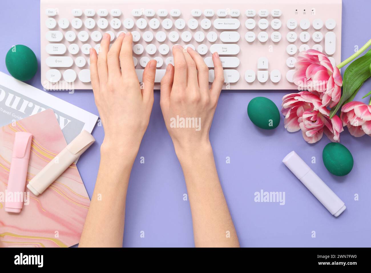 Female hands with computer keyboard, Easter eggs, set of stationery