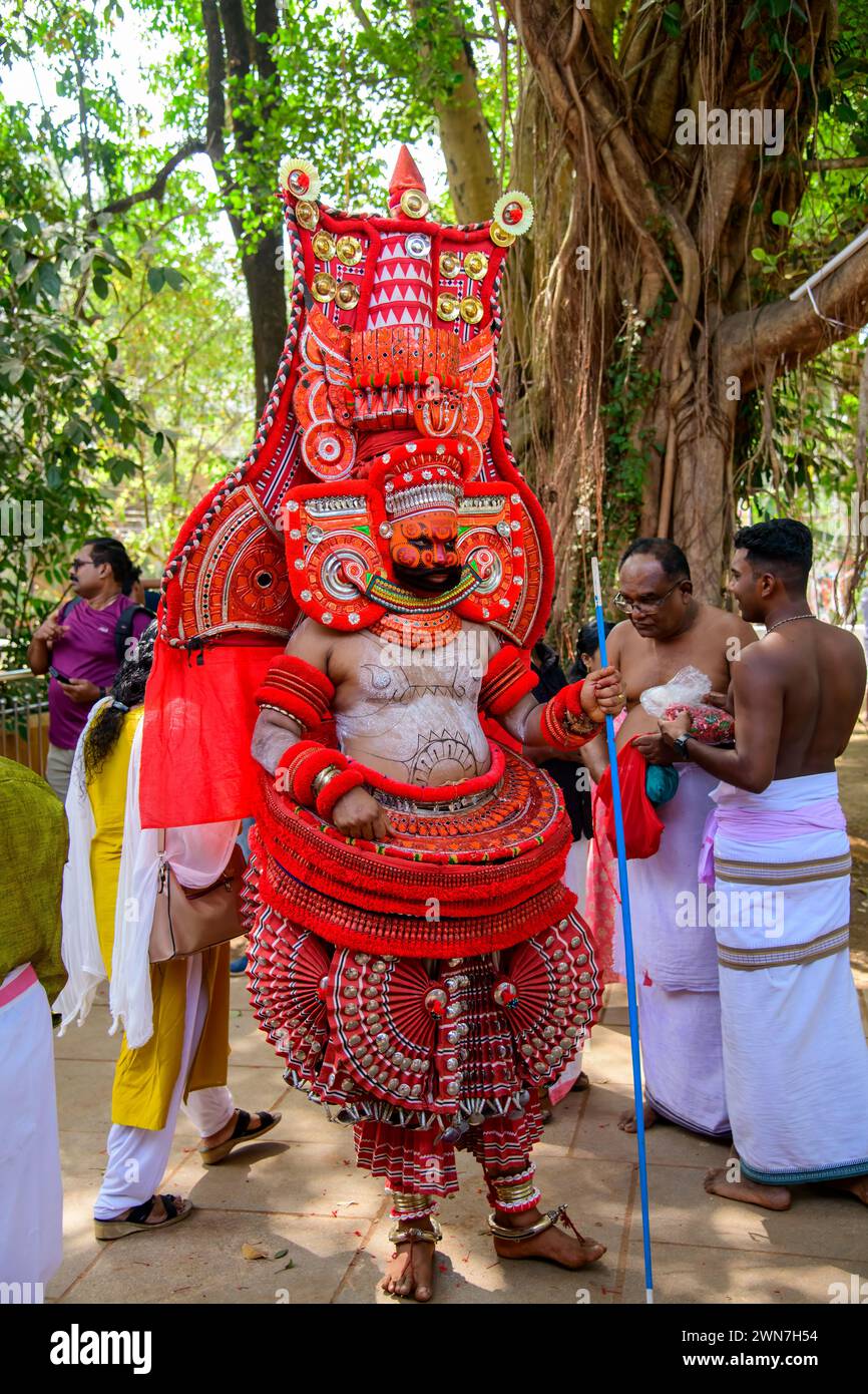 Embark on a Journey Through Time: Andalurkavu's Revered Theyyam Festival, Where Mythology Comes Alive in Spectacular Splendor Stock Photo