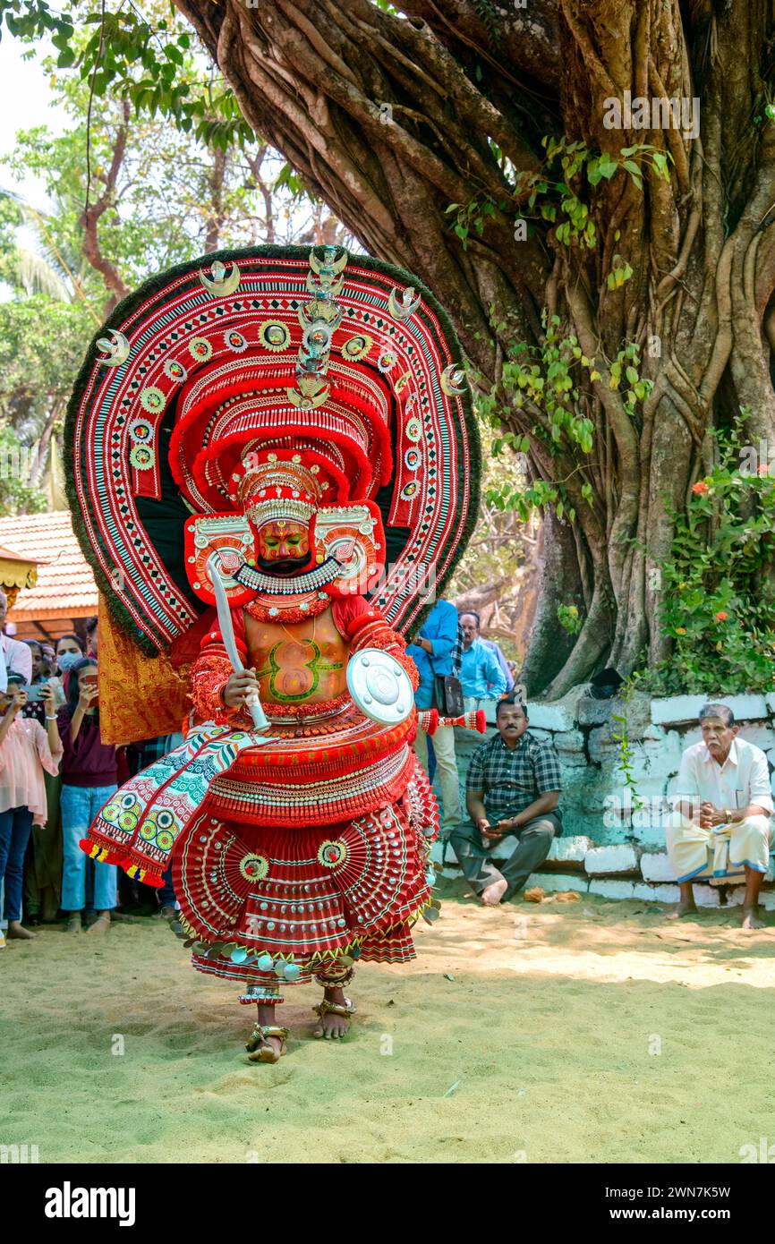 Embark on a Journey Through Time: Andalurkavu's Revered Theyyam Festival, Where Mythology Comes Alive in Spectacular Splendor Stock Photo