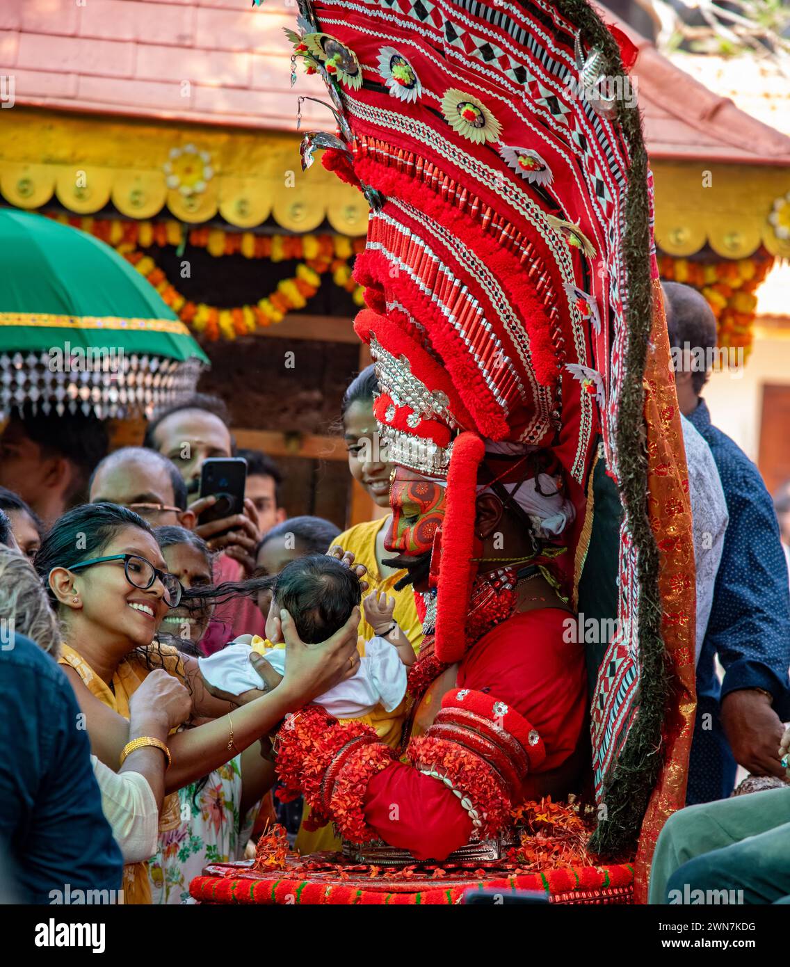 Embark on a Journey Through Time: Andalurkavu's Revered Theyyam Festival, Where Mythology Comes Alive in Spectacular Splendor Stock Photo