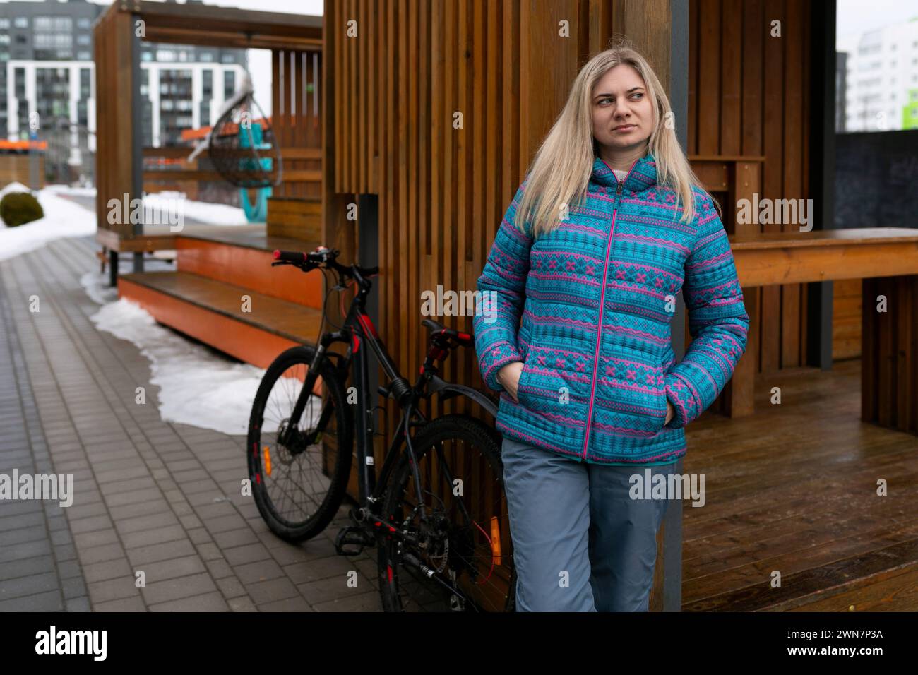 Nice young woman rented a bicycle. Stock Photo