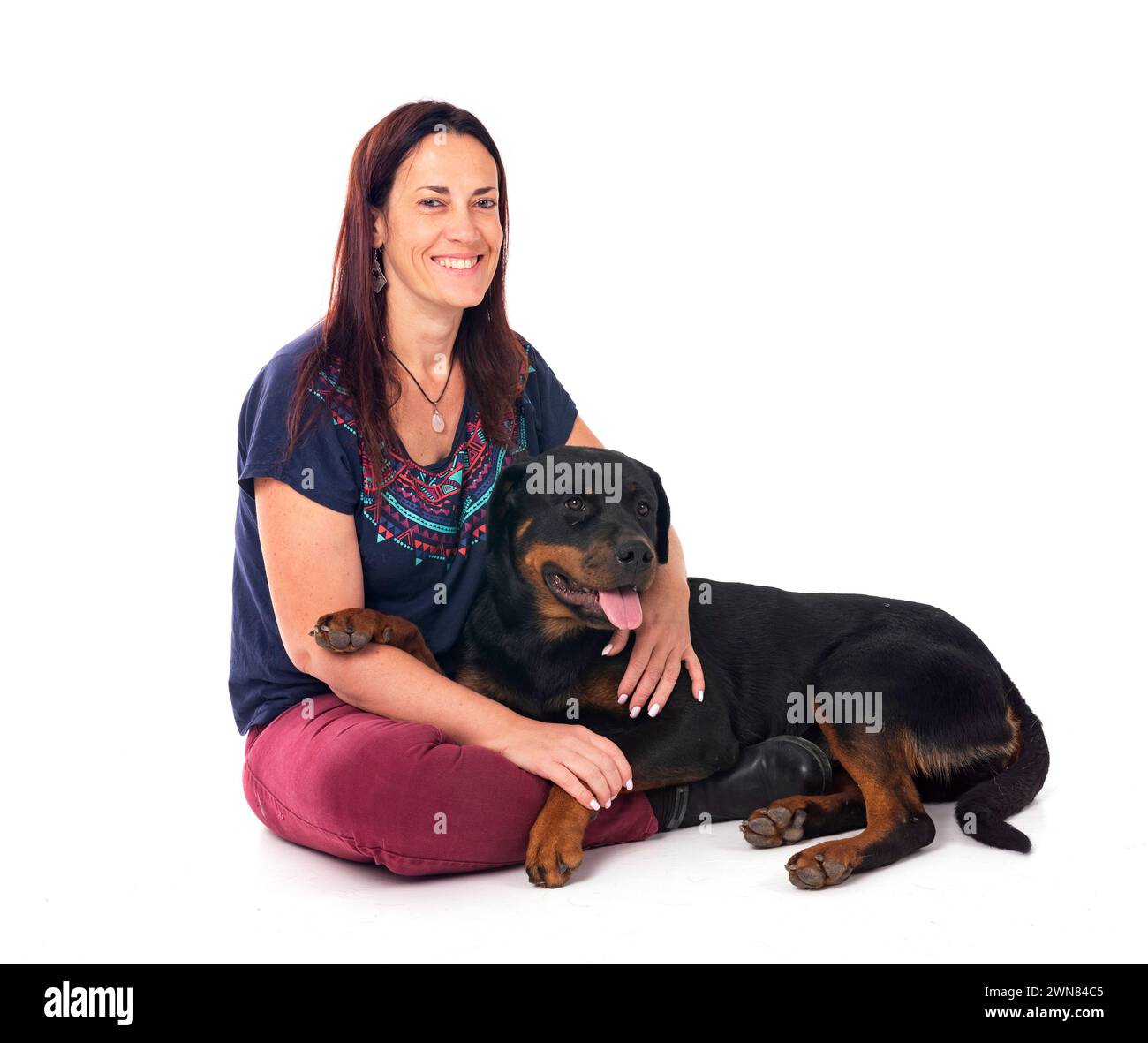 Three Rottweilers Woman purebred rottweiler and woman in front of white background Stock Photo ...