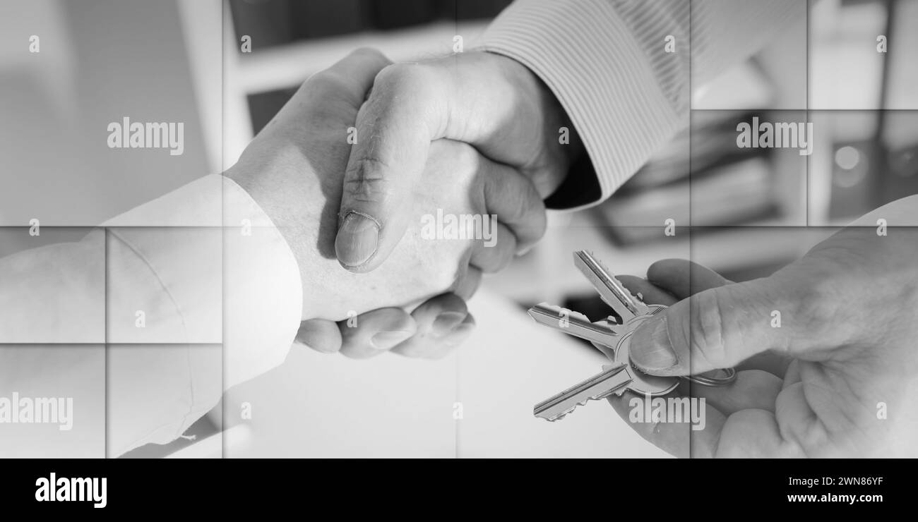Realtor shaking hands with his client by delivering the keys, closeup, geometric pattern Stock Photo