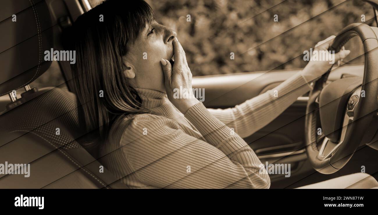 Adult woman behind steering hi-res stock photography and images - Alamy