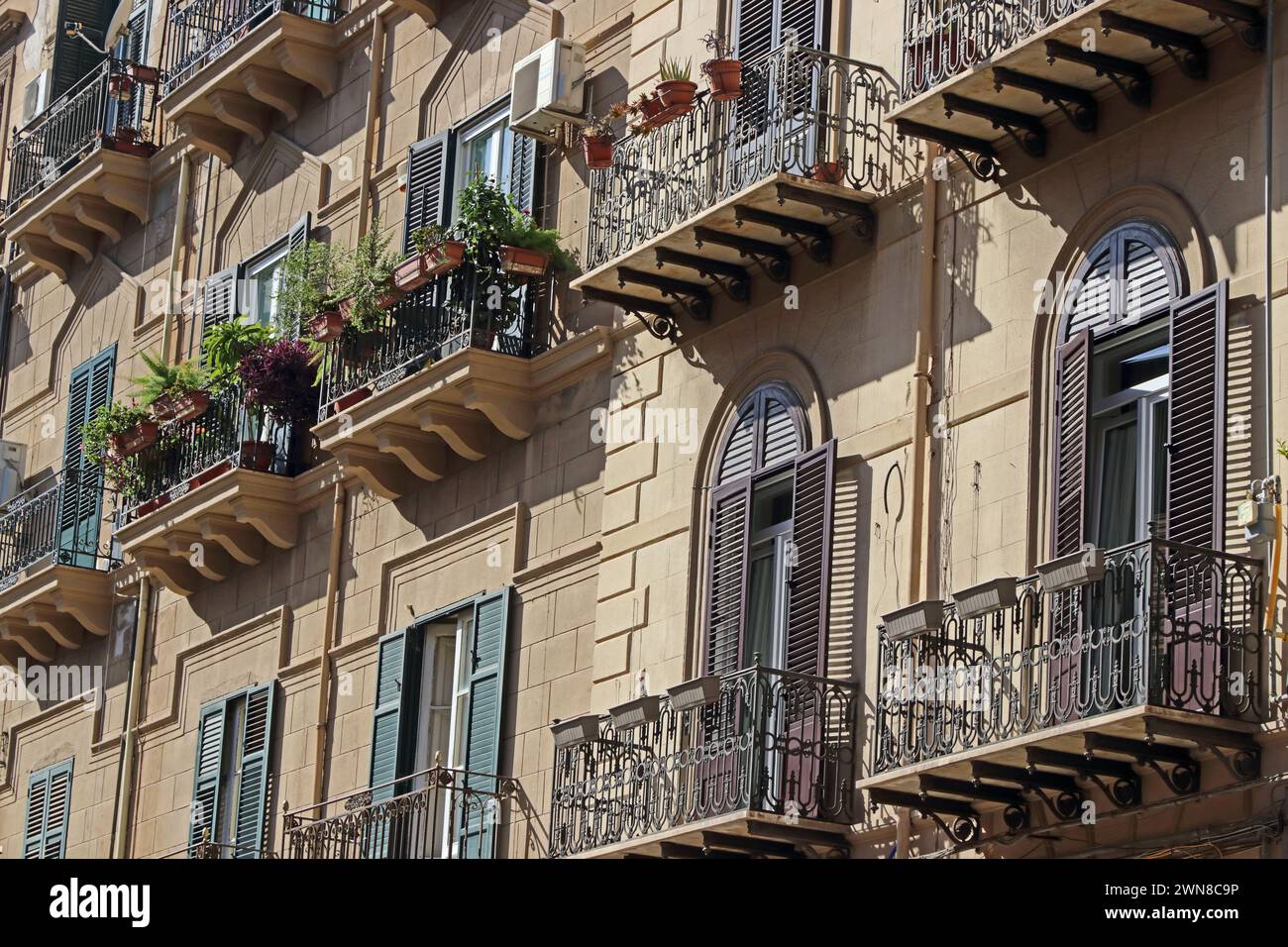 Traditional block of house with balconies and metal railings, Palermo, Sicily Stock Photo