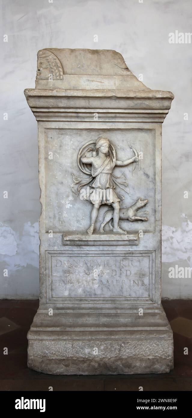 Altar marble to Diana Victrix by Aebutia Amerina, representing Artemis as an archer running. Marble. 2nd century AD. Rome. National Roman Museum (Bath Stock Photo