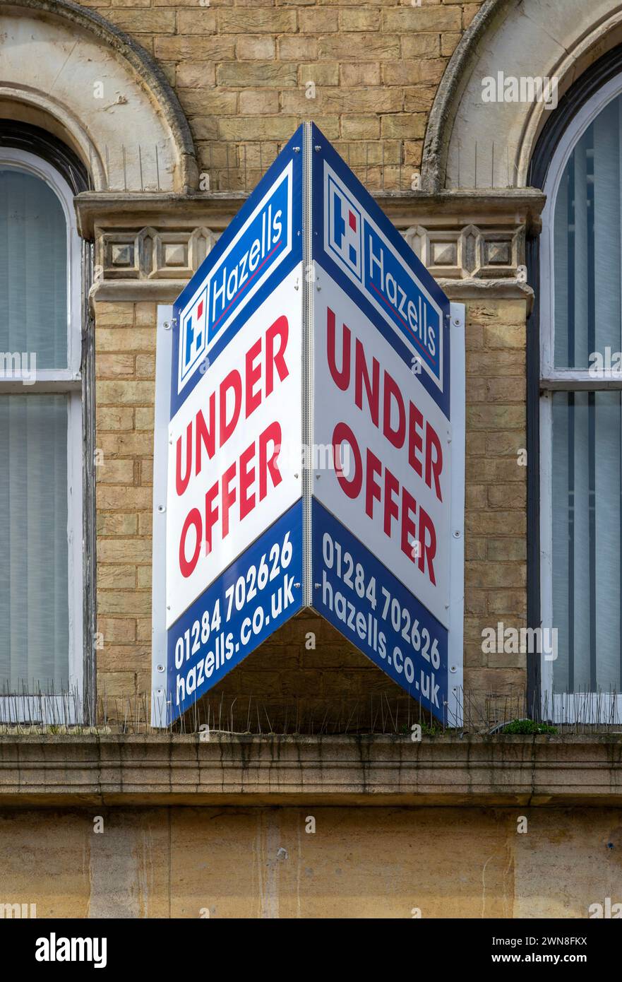 Under Offer sign commercial property Hazells estate agents, Stowmarket, Suffolk, England, UK Stock Photo