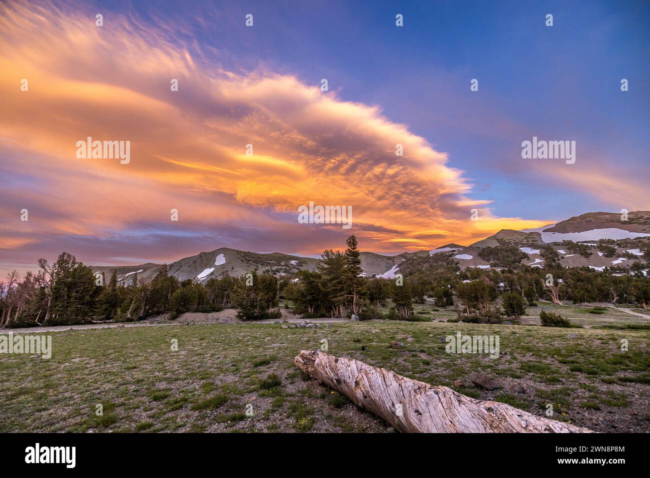 a vibrant sky overlooking a serene landscape Stock Photo