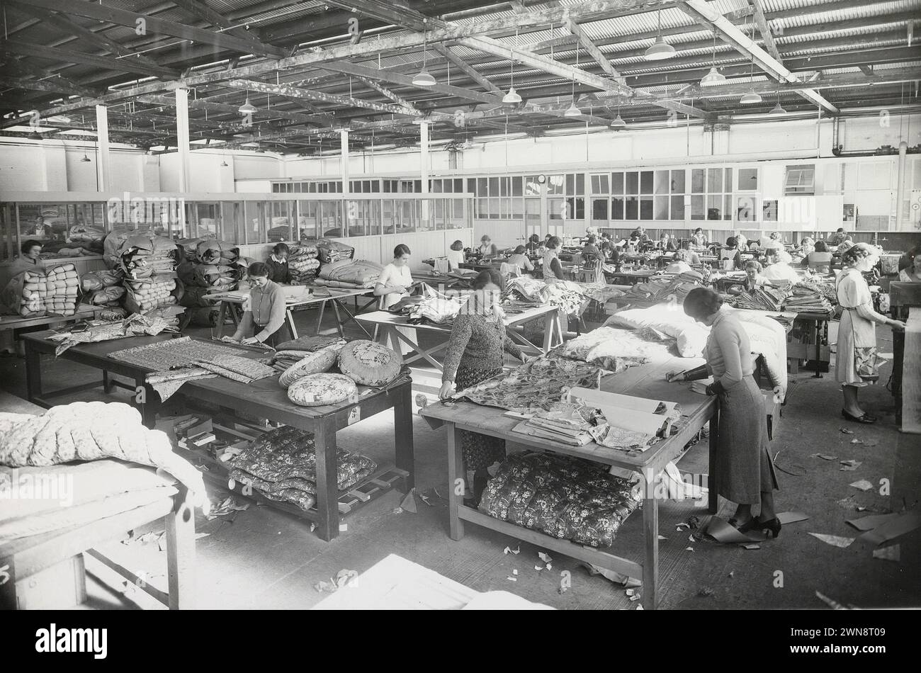 Vintage Photography of Women working in a textile factory. Circa 1935s