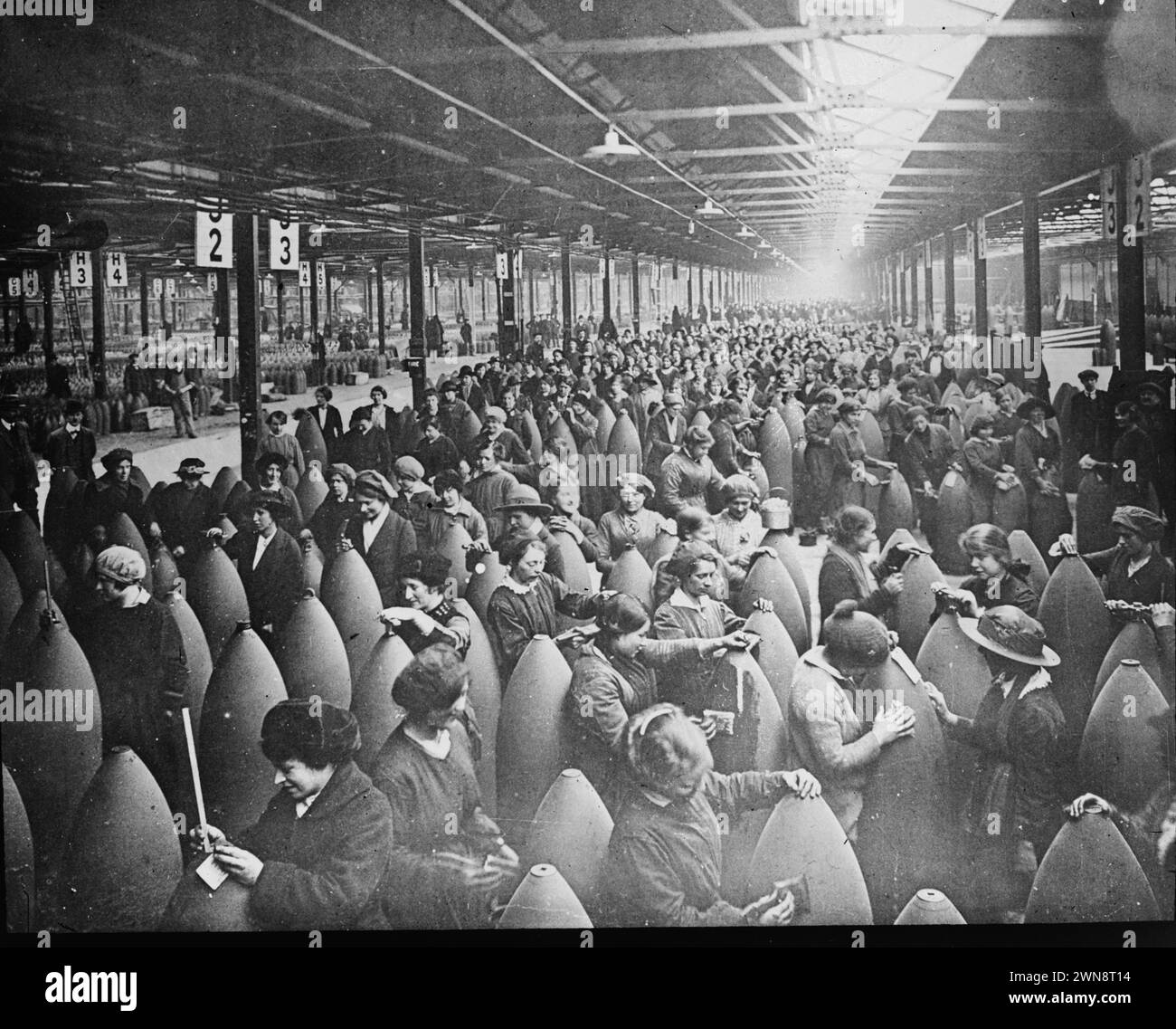 Vintage circa 1917 photographs of women working in a Shell factory in ...