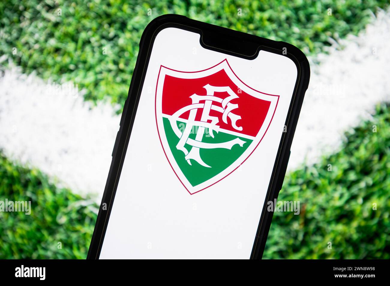 Poland. 23rd Feb, 2024. In this photo illustration, a Fluminense FC football club logo seen displayed on a smartphone. (Photo by Mateusz Slodkowski/SOPA Images/Sipa USA) *** Strictly for editorial news purposes only *** Credit: Sipa USA/Alamy Live News Stock Photo