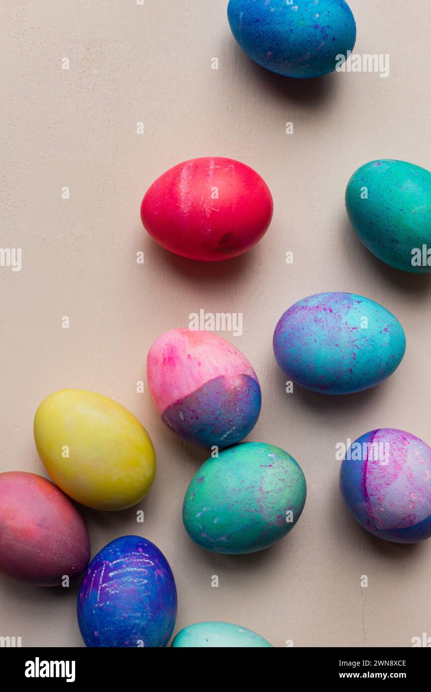 Dyed easter eggs against a pink backdrop Stock Photo