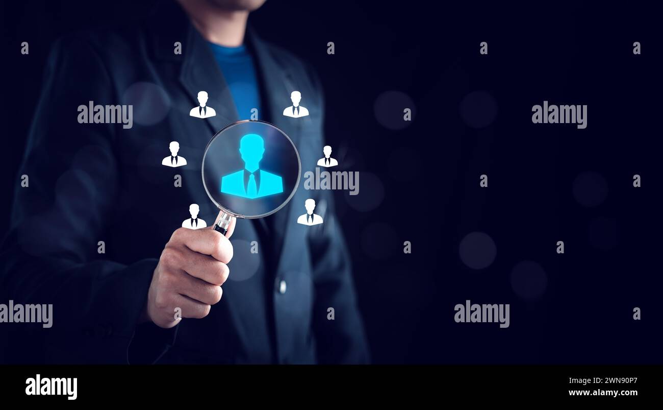 Human Resource Management (HRM), Manager icon on magnifier glass focus to target, Audience, which is among staff icons for human development recruitme Stock Photo