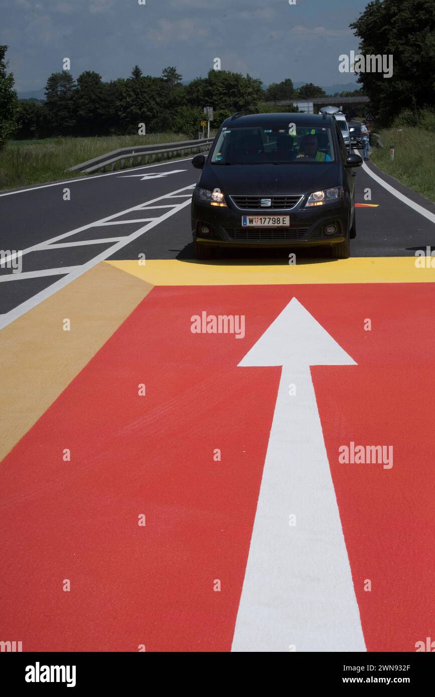 anti wrong way driving marking on the floor of the street anti wrong way driving marking Stock Photo