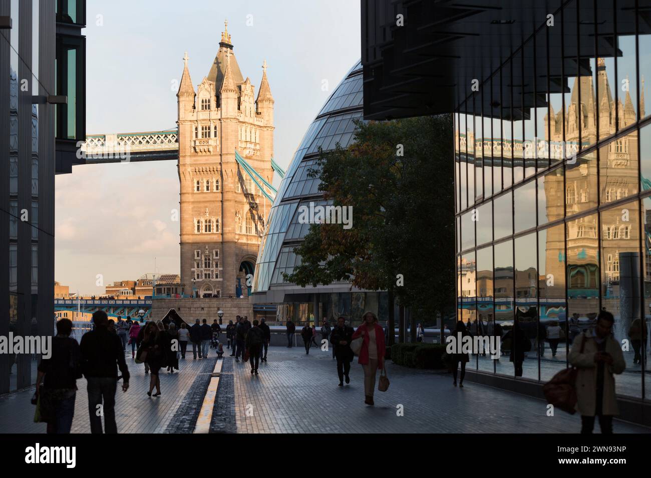 UK, London, Tower Bridge with reflection in building on 'More London Place'. Stock Photo