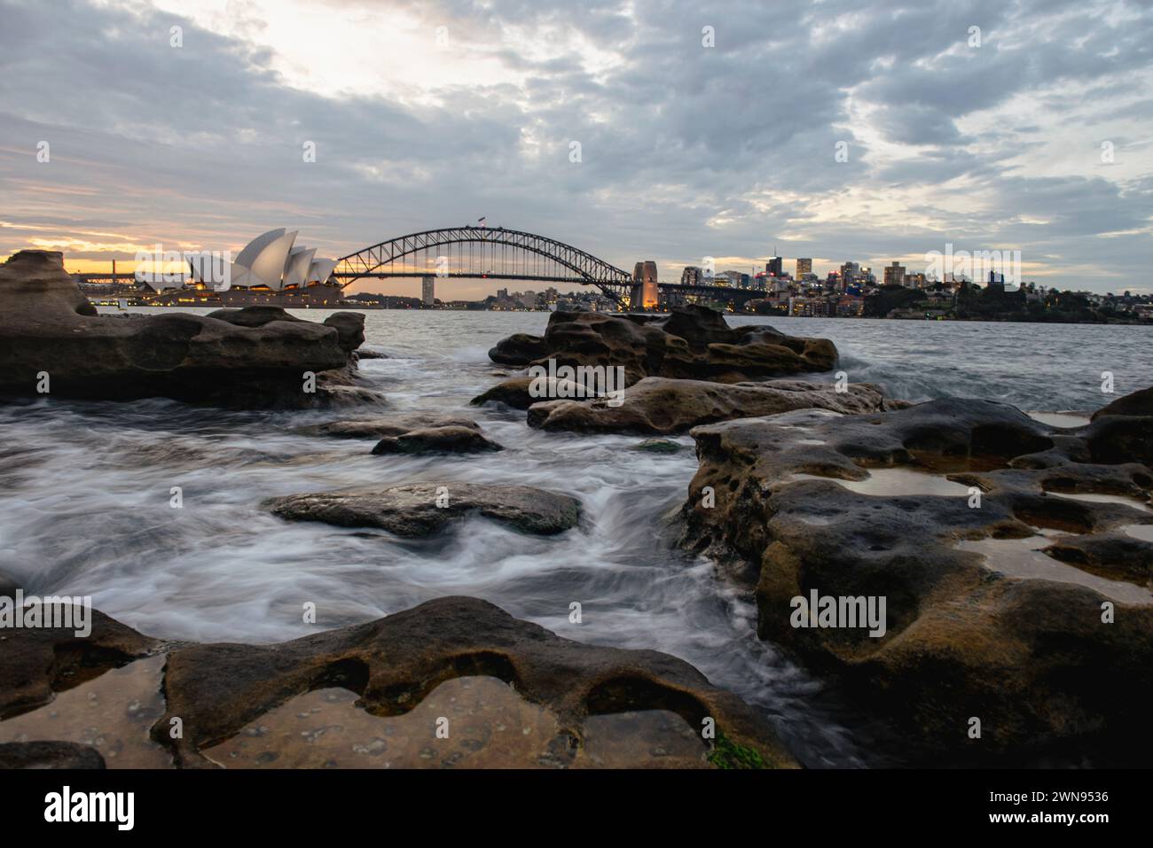 The Sidney Opera House with waterline in foreground Stock Photo