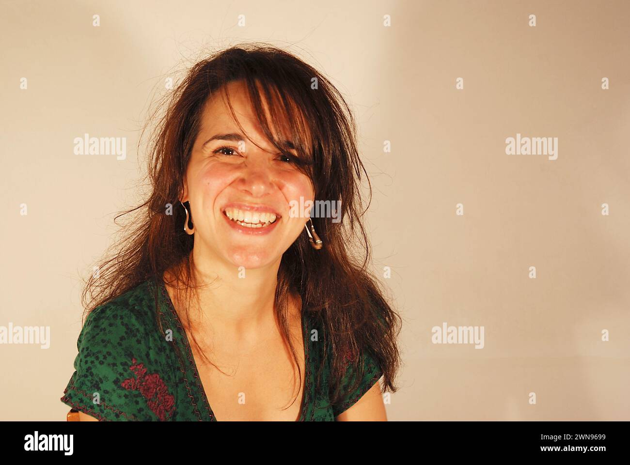 Portrait of young woman laughing. Stock Photo