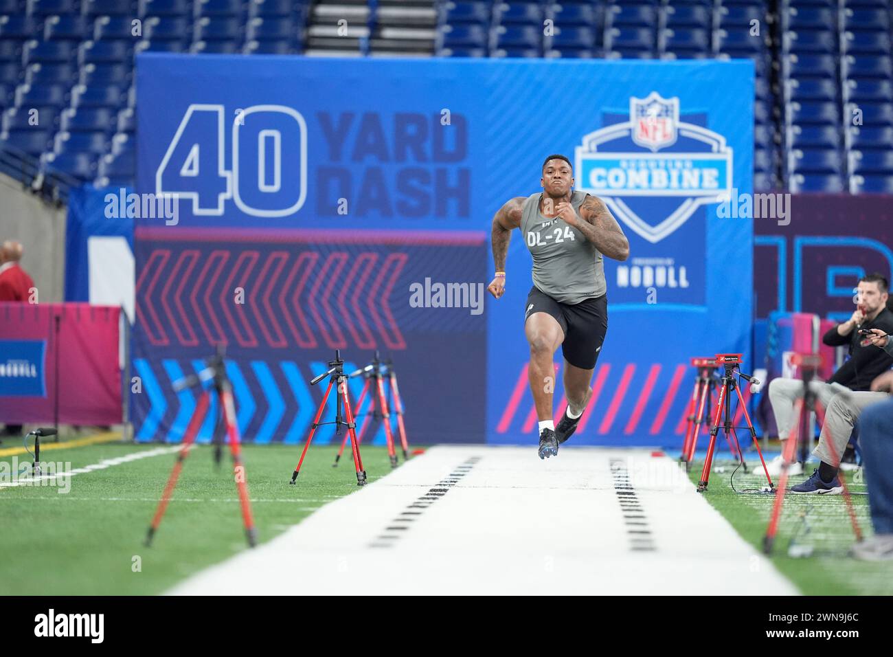 LSU defensive lineman Maason Smith runs the 40-yard dash at the NFL football scouting combine, Thursday, Feb. 29, 2024, in Indianapolis. (AP Photo/Michael Conroy) Stock Photo