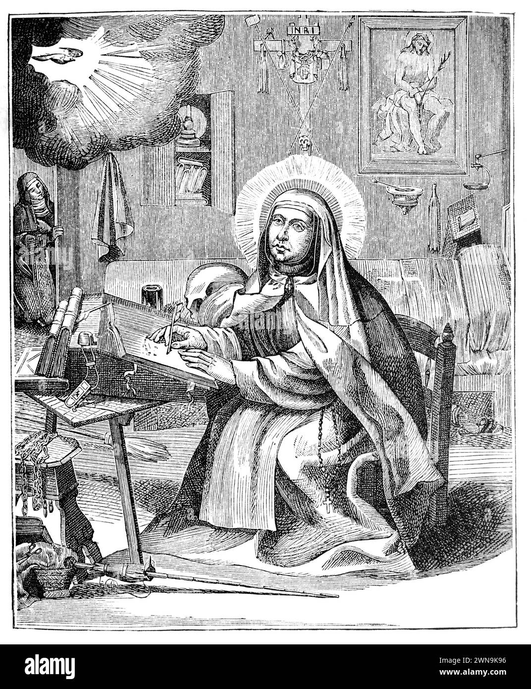 Saint Theresa at her writing desk: Engraving from Lives of the Saints by the Reverend Sabin Baring-Gould, published 1898 Stock Photo