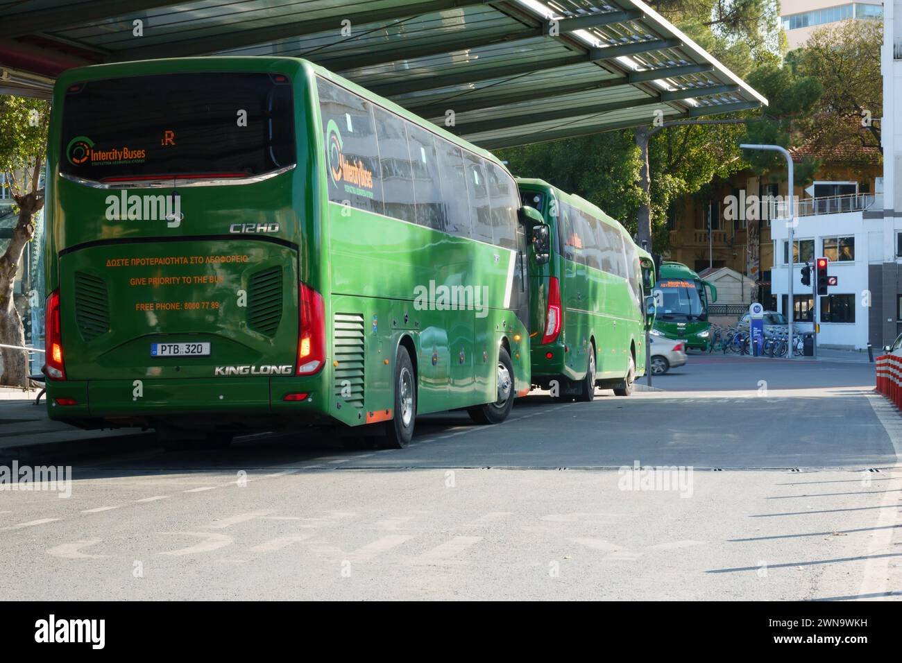 Chinese made King Long C12HD buses of the Cyprus Intercity Buses at the Solomos Square terminus, Nicosia, Cyprus. Feb 2024 Stock Photo