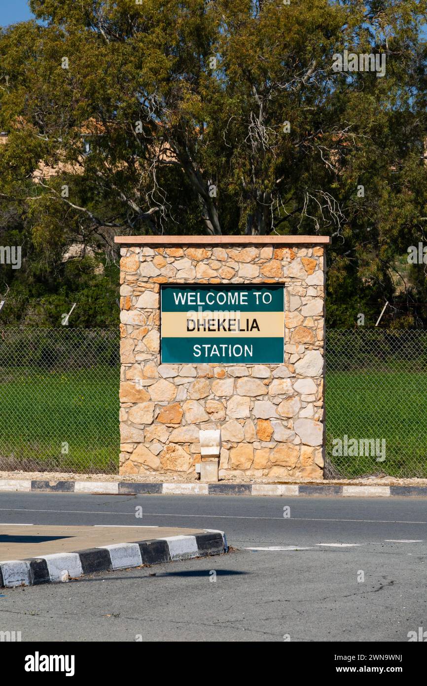 Welcome to Dhekelia Station sign at the entrance to the camp. Larnaca, Cyprus. Feb 2024 Stock Photo
