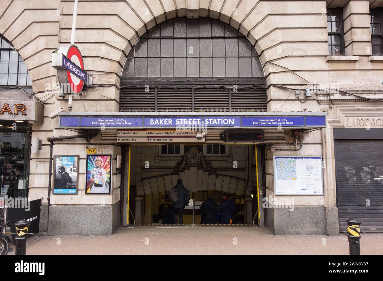 People near the entrance to Baker Street Station on Euston Road, London, England, U.K. Stock Photo