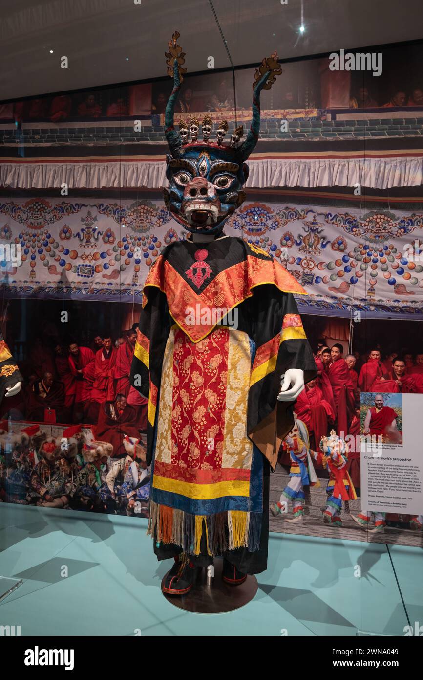 Costume of Yamantaka, Destroyer of the God of Death Yama in Tibetan Buddhist tradition, mask and silk robes collected in Darjeeling in 1919, exhibitio Stock Photo
