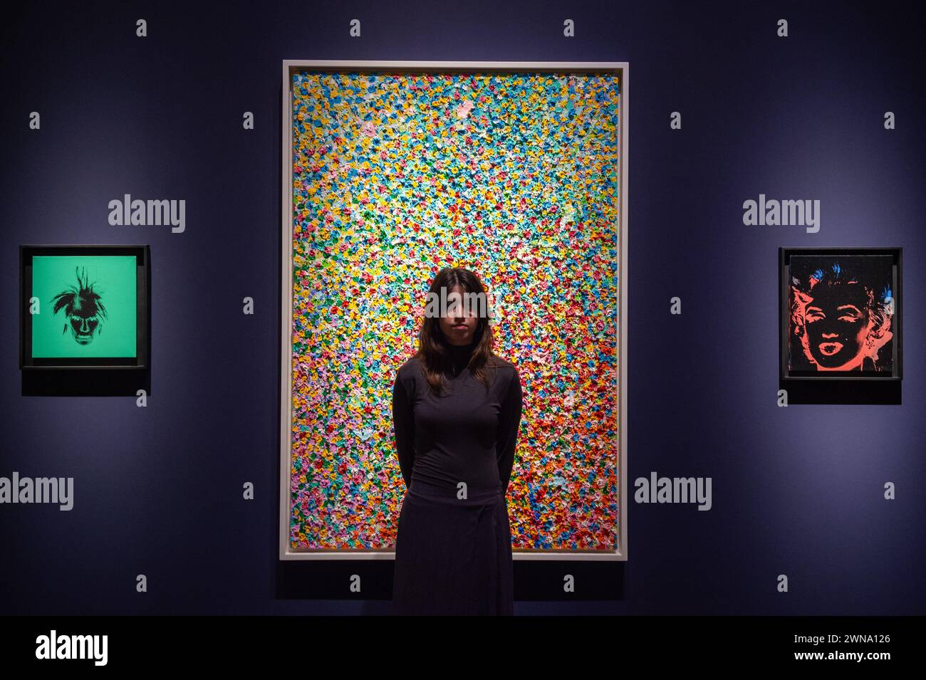 London, England, UK. 1st Mar, 2024. Christie's staff member stands by Damien Hirst's ''Veil of Serendipity'' estimated at GBP 650,000 - 850,000, during the press preview of Christie's '20th/21st Century London Evening Sale' and 'The Art of The Surreal Evening Sale'. The sales will take place on the evening of March 7. (Credit Image: © Thomas Krych/ZUMA Press Wire) EDITORIAL USAGE ONLY! Not for Commercial USAGE! Stock Photo