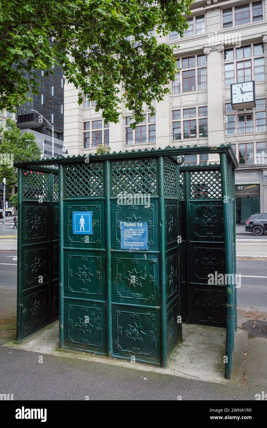 Old-fashioned cast iron public toilet on the corner of Batman Avenue and Flinders Street, Melbourne, Victoria, Australia Stock Photo
