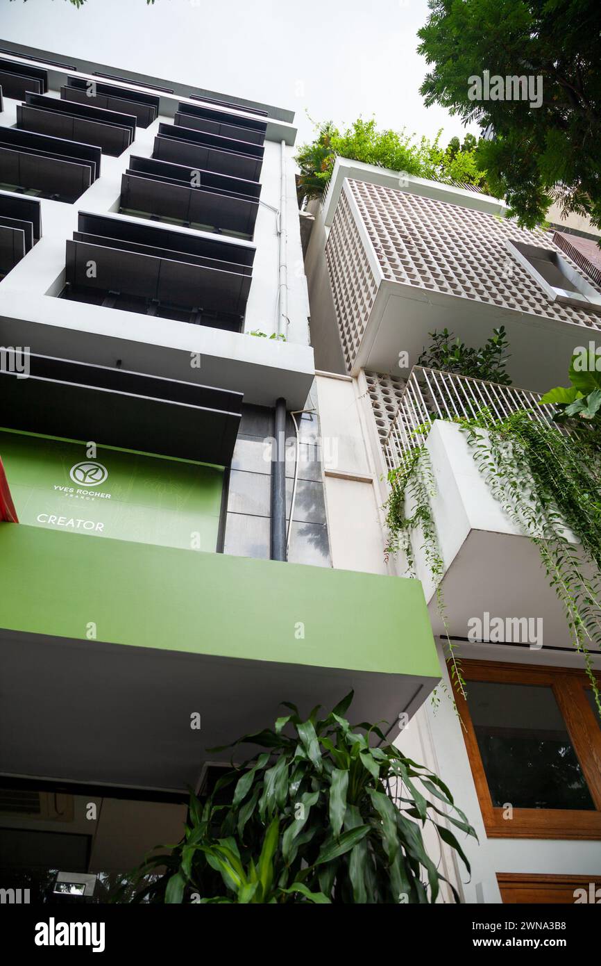 Ho Chi Minh City, Vietnam - June 4, 2023: White and green Yves Rocher logo on a store of a French cosmetics company. Advertisement of a global brand s - Stock Image