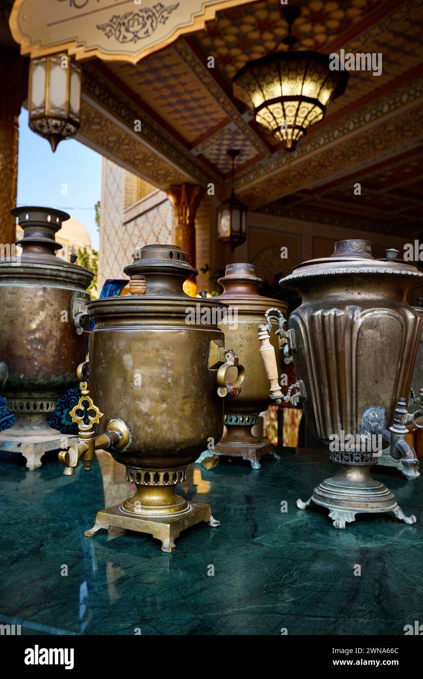 Traditional russian pot samovar in tea house chaihana restaurant in Samarkand Eternal city Boqiy Shahar Registan complex in Uzbekistan. Stock Photo