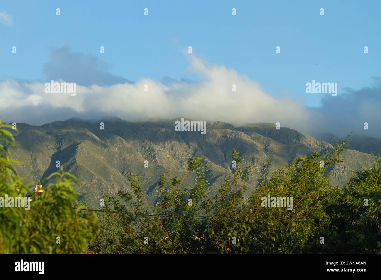 View of mountains with clouds over them Stock Photo