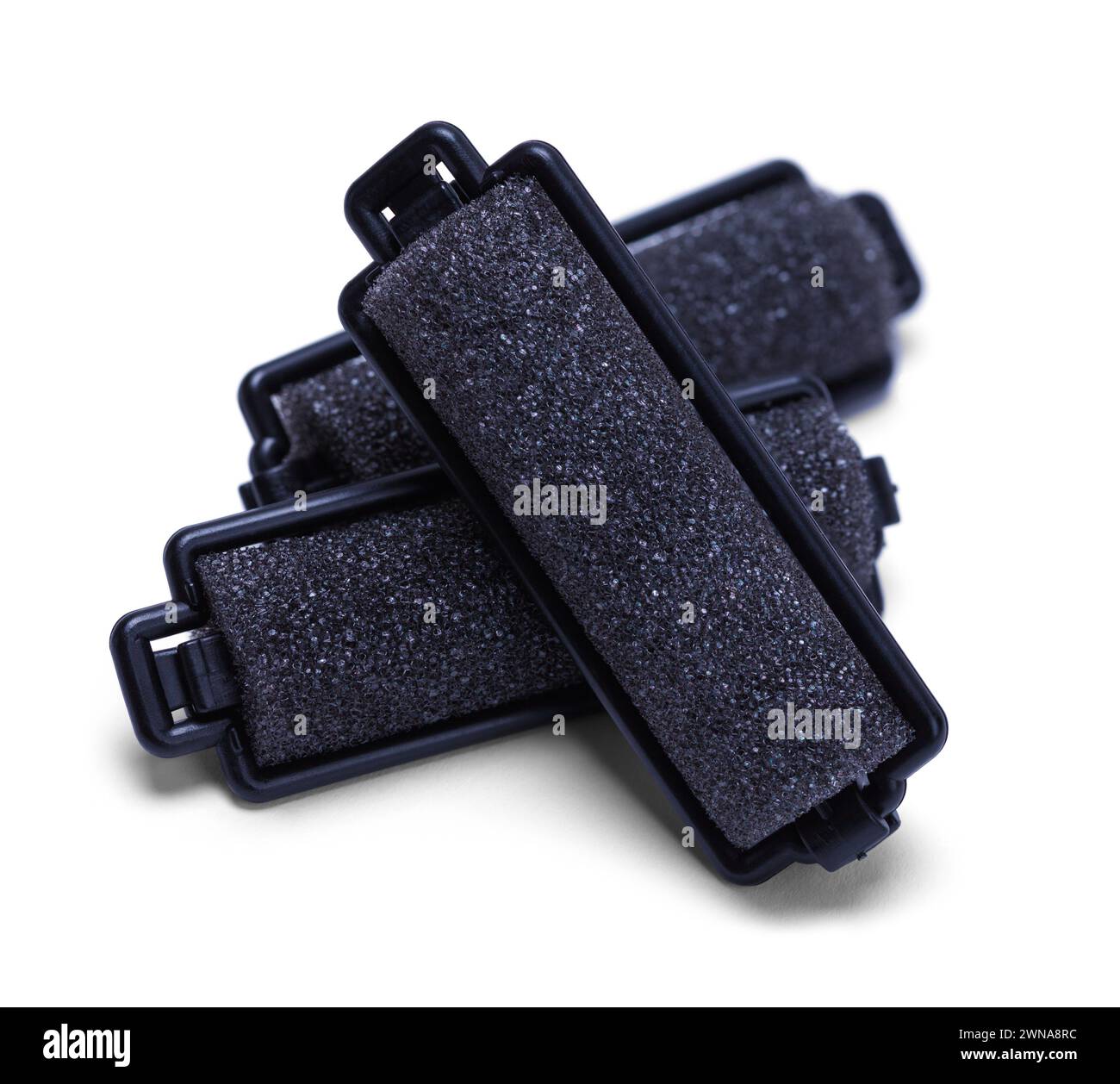 Black Hair Curlers Cut Out on White. Stock Photo