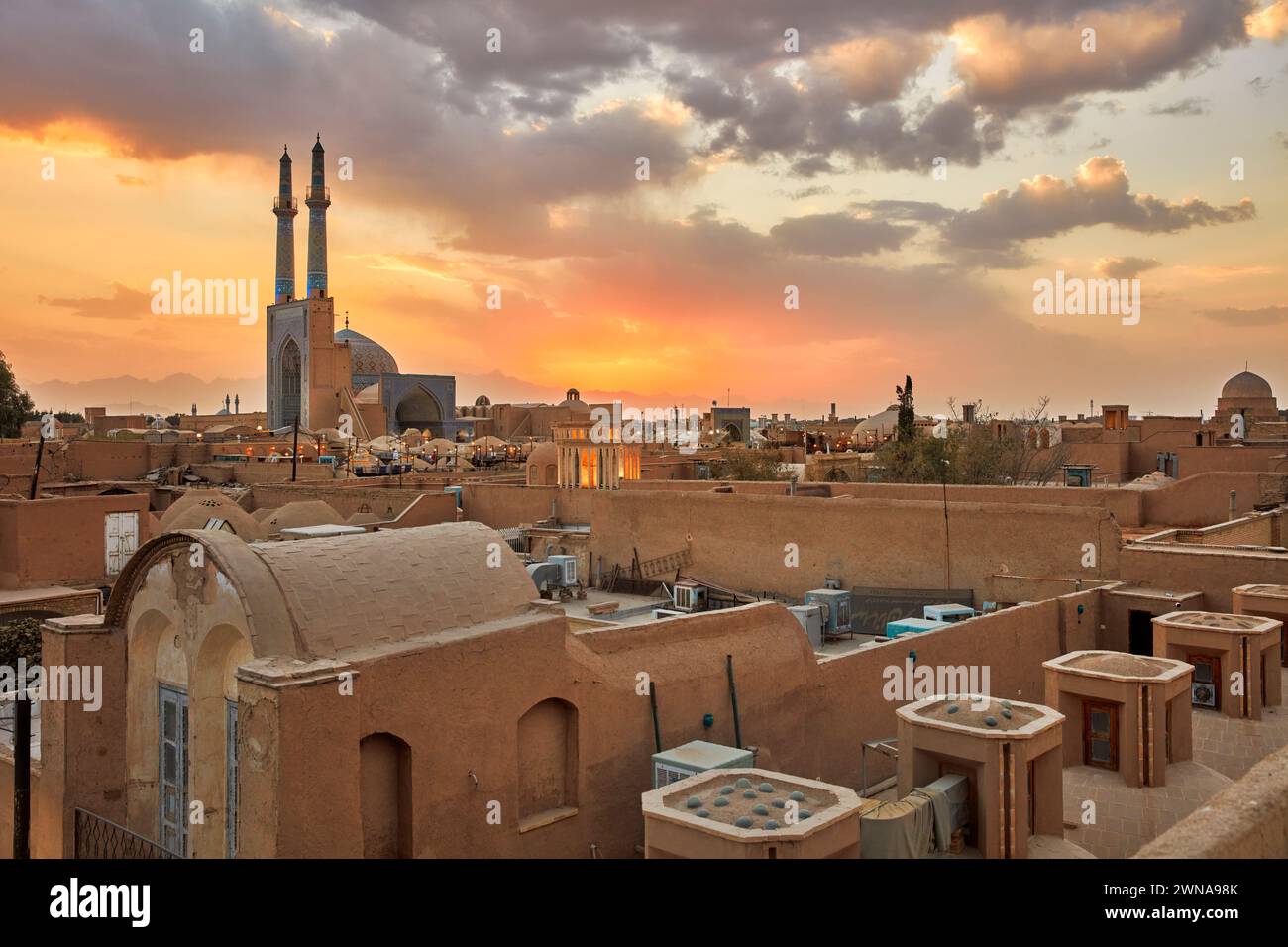 Rooftop view of old adobe buildings in the historical Fahadan Neighborhood at sunset. Yazd, Iran. Stock Photo