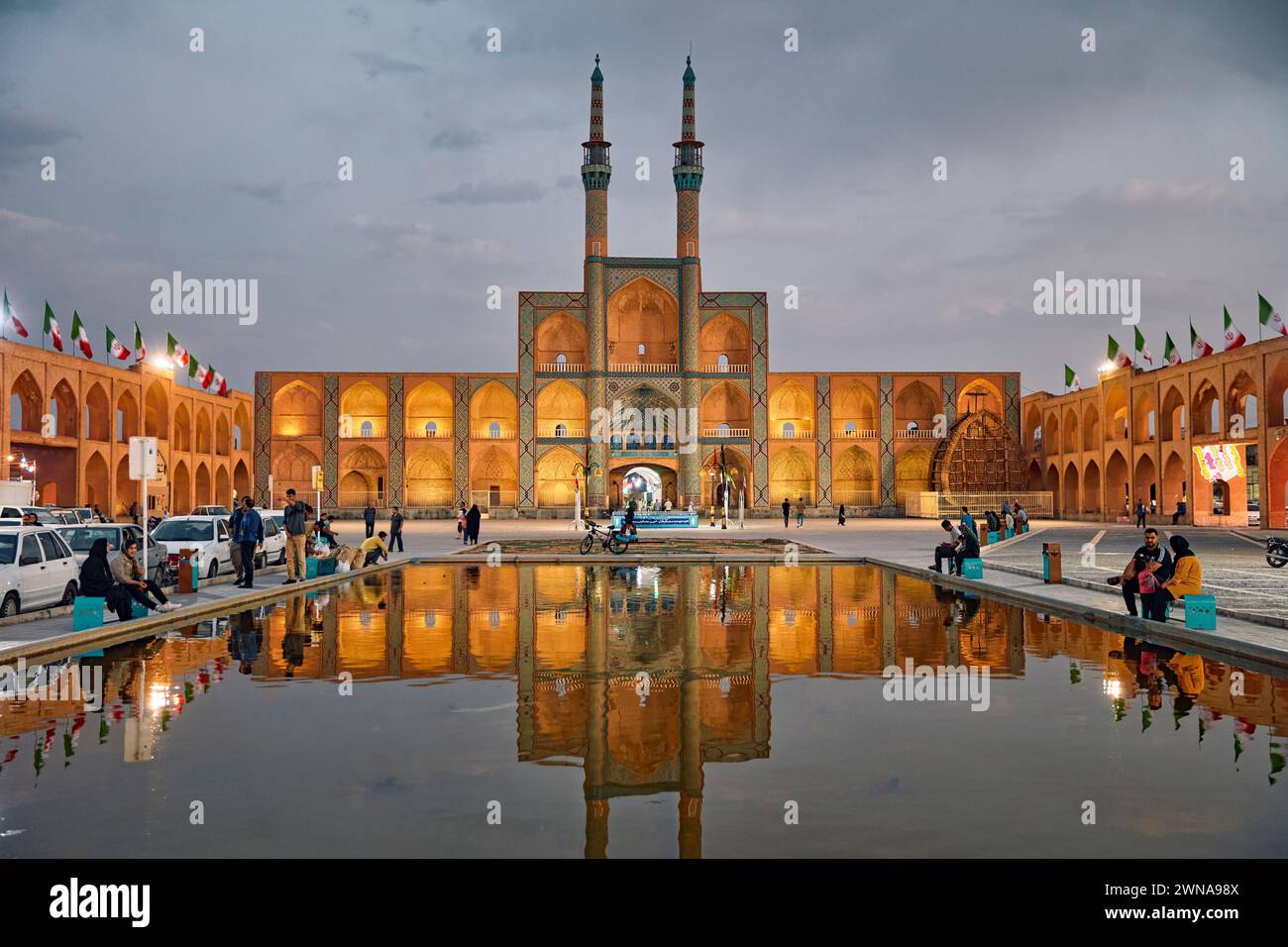 View of Amir Chakhmaq Complex and adjacent water pool illuminated at ...