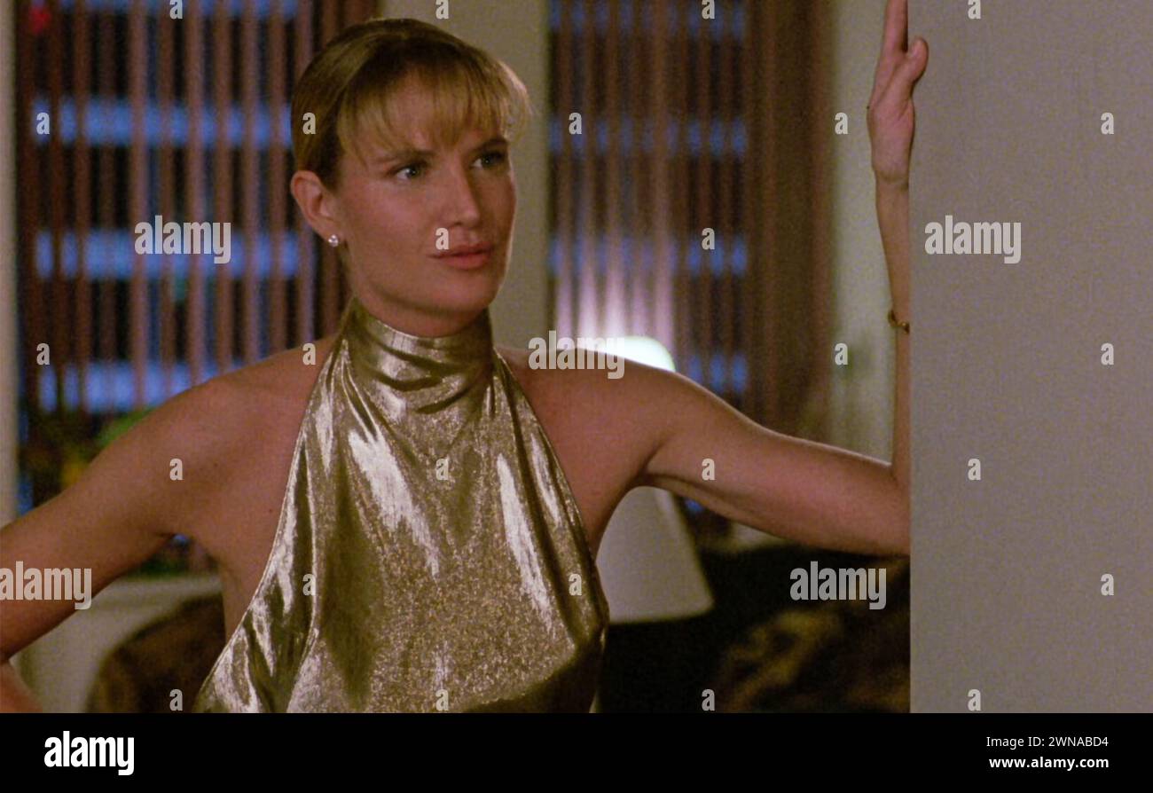 USA. Kelly Lynch in a scene from the (C)Buena Vista Pictures film: Cocktail (1988) . Plot: A talented New York City bartender takes a job at a bar in Jamaica and falls