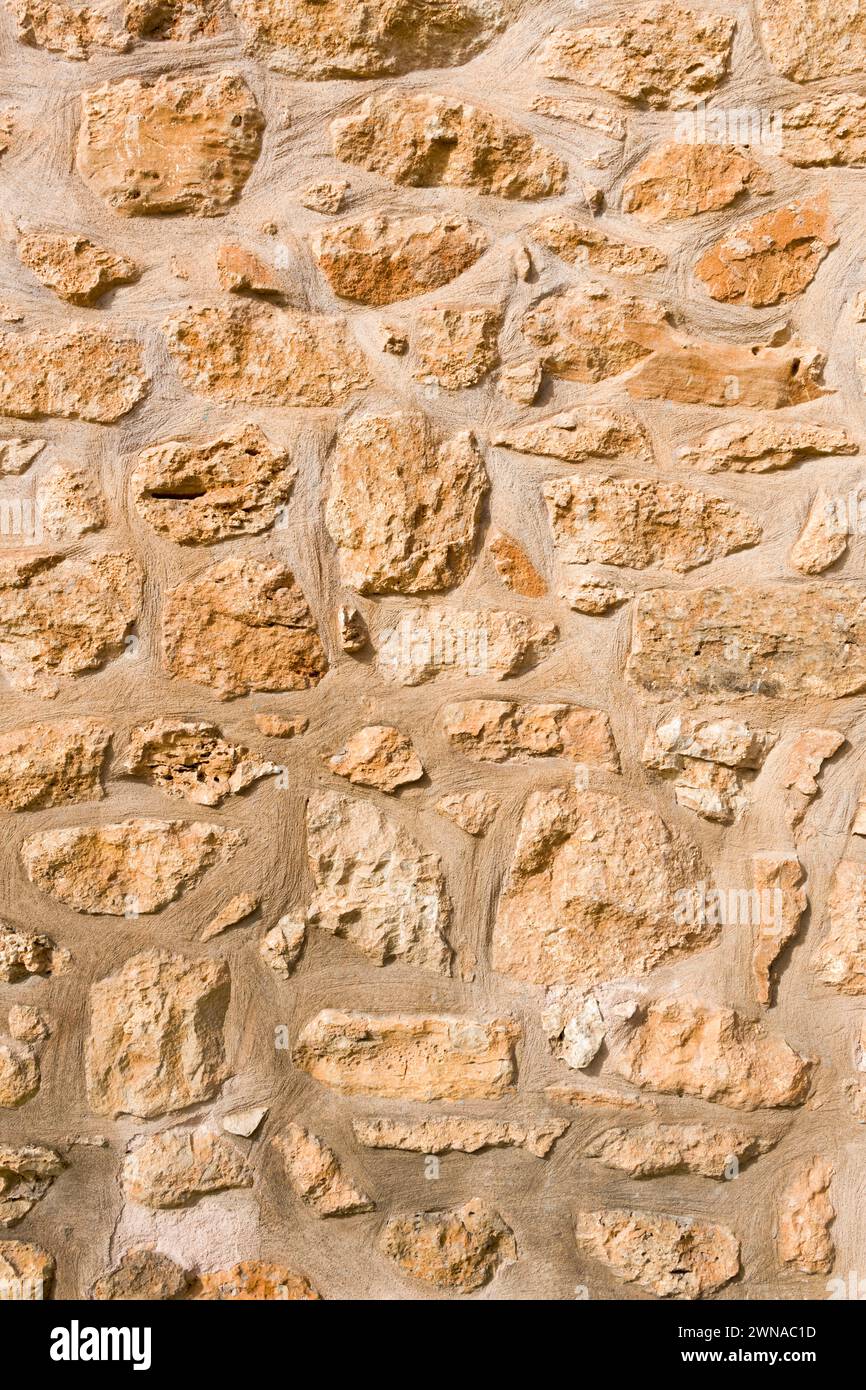 Rough wall with stones in Santayi, Mallorca Stock Photo